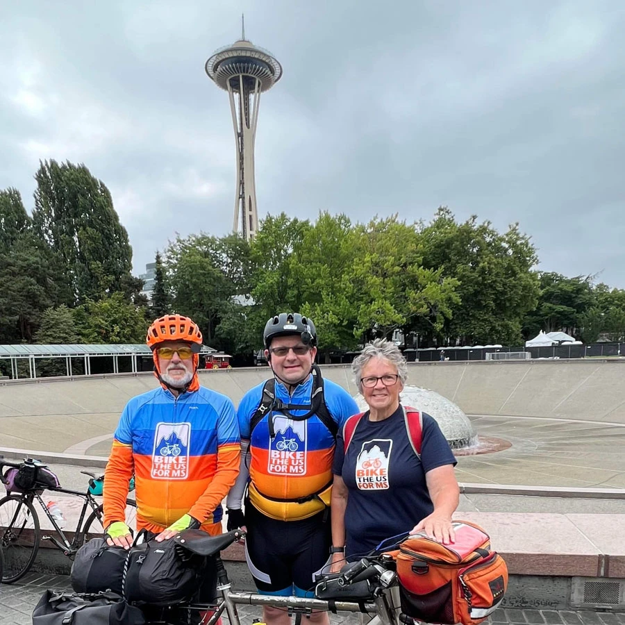 Alumni Gayle visiting the Olympic Peninsula team as they set off from the space needle in Seattle.