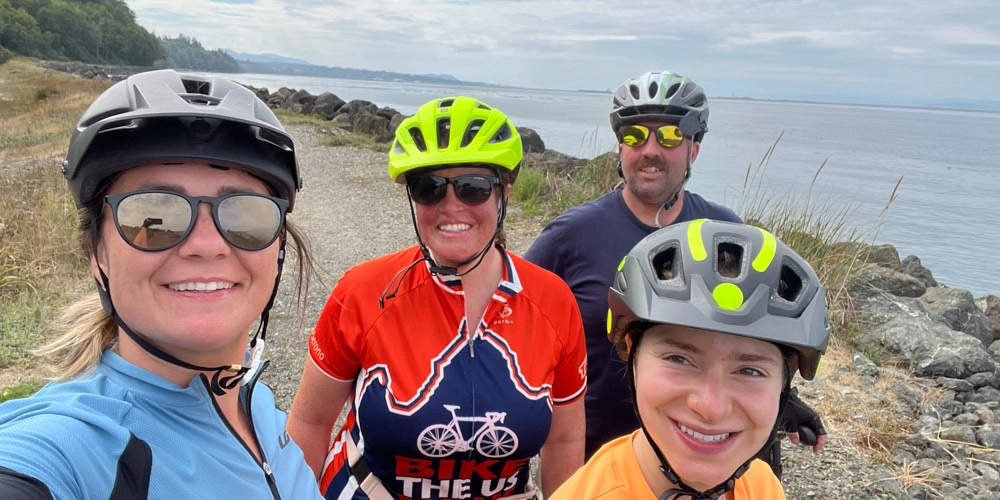 Nikki (center) with family and friends around her as she tackles cycling with MS on the Olympic Peninsula Bike Tour.