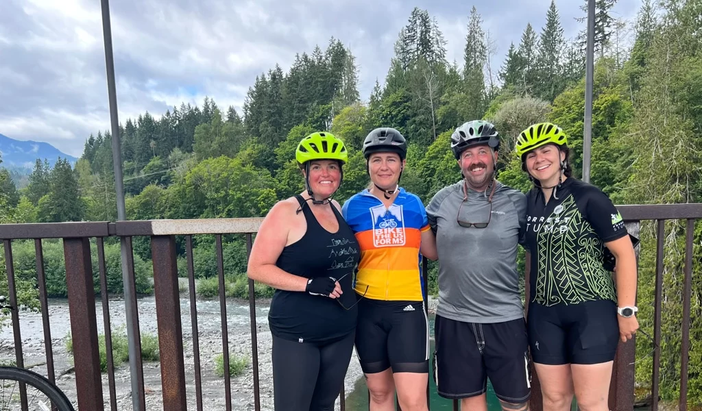 Nikki (left) with friend Penny, brother Rob and Bike the US for MS alumni and board member, Lina (right).