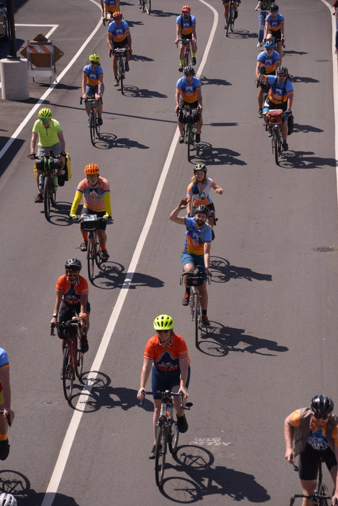 Nikki leading the way off the ferry as the team arrive back in Seattle having completed their Olympic Peninsula cycle with MS.