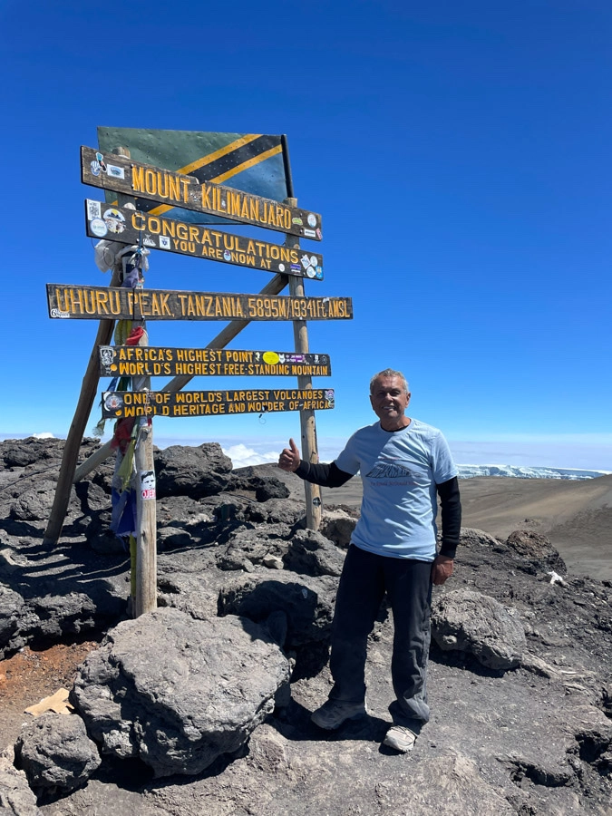 Ed conquering mount Kilimanjaro.