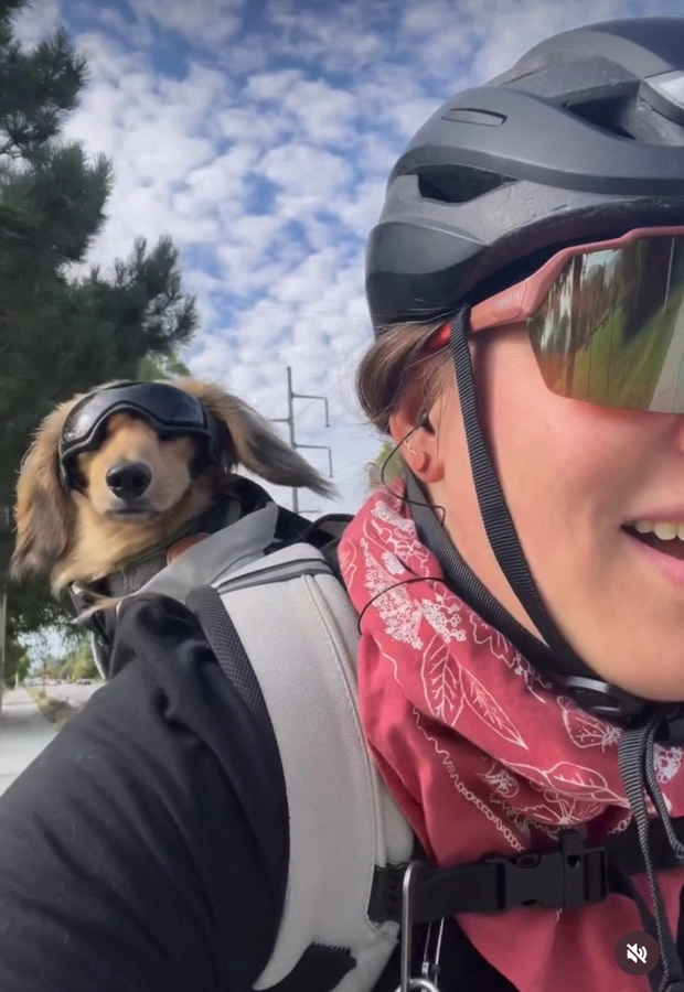 Natalia and her pup Dash out on a ride.