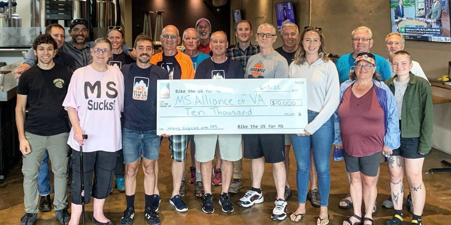 Neil (back row, second from right) will be back Route Leading the inaugural North Lakes ride this summer.