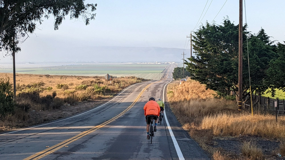 Taking in the agriculturally rich Salinas Valley views whilst cycling through California on the Pacific Coast Bike Route.