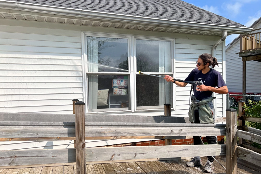 Power washing the house at our MS service project.